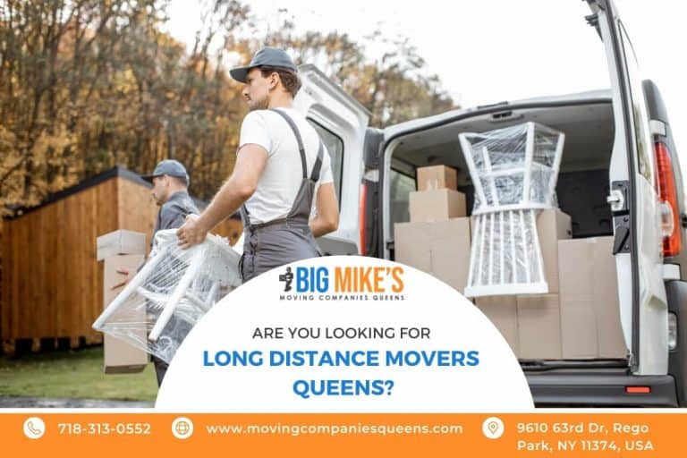 Two movers loading furniture and boxes into a moving van, showcasing long distance moving services in Queens. Big Mike's Moving Companies Queens logo prominently displayed, emphasizing professional relocation assistance.
